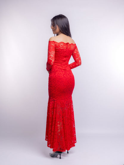 Red lace dress worn by a person on a white background