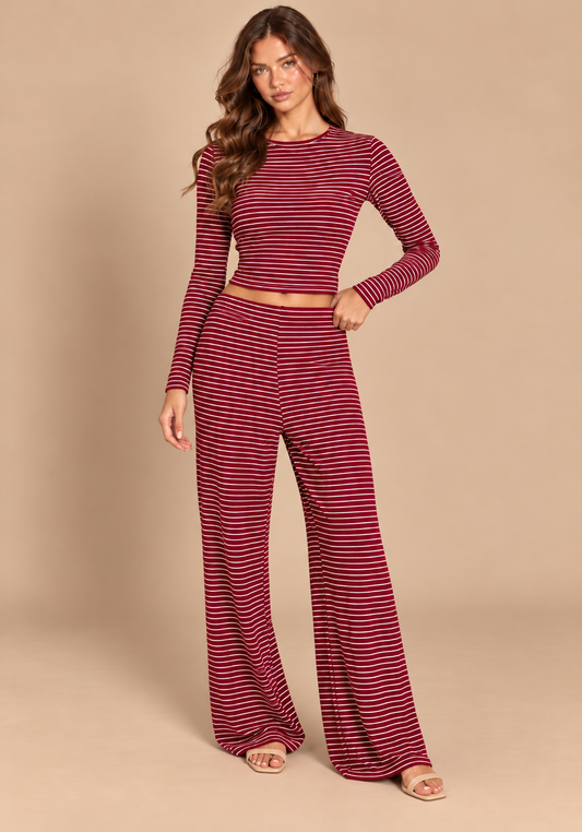 Front view of burgundy striped crop top and matching wide-leg trousers